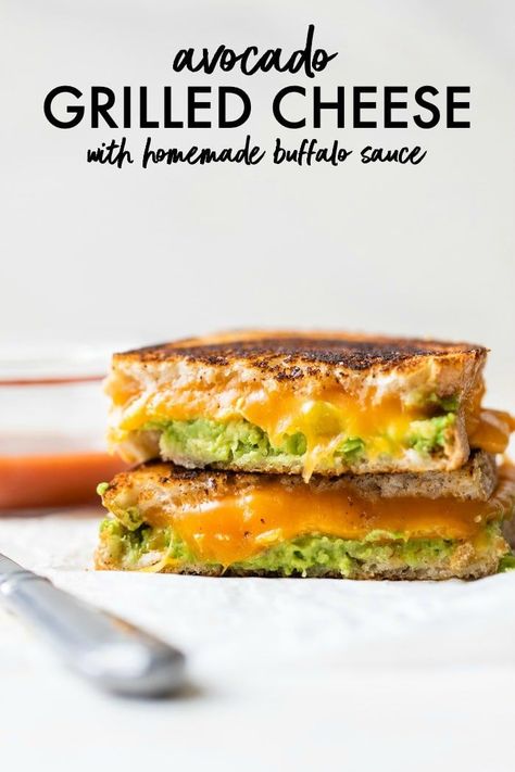 AVOCADO GRILLED CHEESE SANDWICH -- just like your favorite childhood food but with the addition of mashed avocado. It's an easy lunch option and even more delicious when paired with homemade buffalo sauce #sandwich #grilledcheese #avocado Grilled Cheese Avocado, Avocado Grilled Cheese, Guacamole Grilled Cheese, Gourmet Grill, Childhood Food, Gourmet Grilling, Grilled Avocado, Homemade Buffalo Sauce, Homemade Sandwich