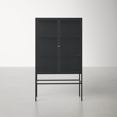 An industrial beauty. The cabinet flashes an all-mechanical look with its pure iron construction and dark finish. With tall doors and plenty of shelving space, this cabinet means business. | AllModern Nyla Iron 2 - Door Accent Cabinet Metal in Black / Gray, Size 71.0 H x 40.0 W x 18.0 D in | Wayfair Tall Doors, 2 Door Accent Cabinet, Door Accent Cabinet, Door Accent, Accent Chests And Cabinets, Metal Cabinet, Accent Doors, Black Cabinets, Accent Cabinet
