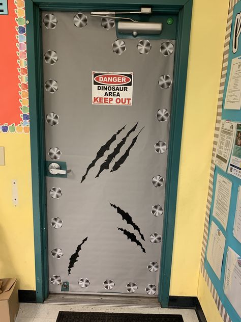 A fun door decoration I did in my classroom for a jurassic Park themed! Jeep Classroom Door, Jurassic Park Office Decor, Jurassic Park Decoration, Jurassic Park Hallway Decorations, Jurassic Park Door Decoration, Jurassic Park Room Ideas, Jurassic Park Diy Decorations, Diy Jurassic World Party, Dinosaur Door Classroom