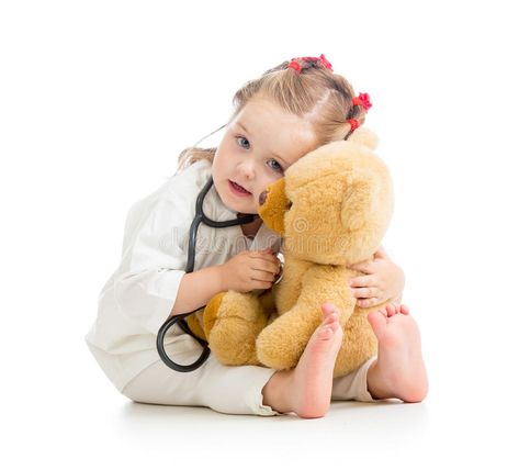 Child with clothes of doctor playing toy. Child with clothes of doctor playing p #Sponsored , #Ad, #AD, #clothes, #playing, #doctor, #Child Toys, Child Playing, Playing Doctor, Plush Toy, Stock Images Free, Kids Outfits, Teddy Bear, Stock Images, Baby Face