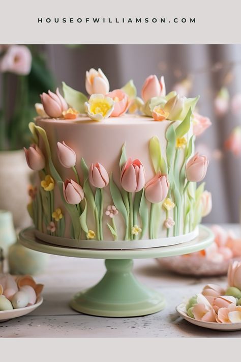 Looking for a beautiful idea for your next cake? Check out this Easter-themed masterpiece! It's full of pretty pastel colors and has edible tulips made from sugar and fondant. Perfect for making your Easter brunch extra pretty! Pretty Pastel Colors, Easter Cake Decorating, Tulip Cake, Flower Cake Design, Torte Creative, Patisserie Fine, Spring Cake, Easter Cake, Cake Decorating Designs