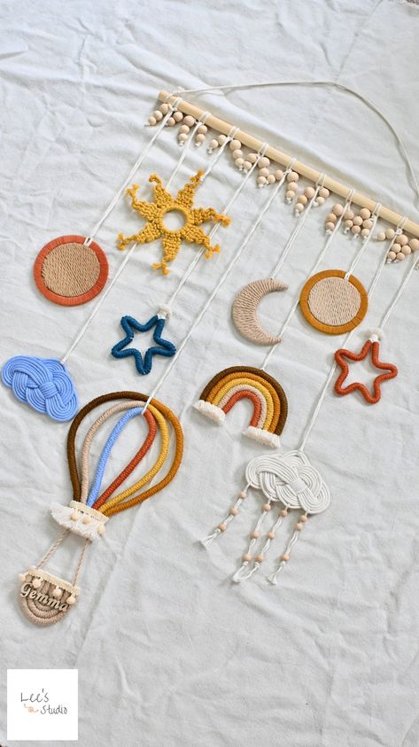 Traveling to Space From Baby Room 🌤️Take your child on a space adventure with our unique macrame wall art including hot air balloons, suns, rainbows, and planets! 🌤️Each piece is created with care and creativity, bringing a fun and magical space to your baby's bedroom or playroom. 🌤️With a hot air balloon climbing high and the sun shining brightly, your child can imagine themselves adventuring through space every day. 🌤️This Macrame wall art product not only makes your baby's space unique bu Amigurumi Patterns, Nursery Ideas Space, Macrame Kids Room, Macrame Baby Room, Air Balloon Nursery, Hot Air Balloon Adventure, Unique Macrame, Balloon Nursery, Macrame Baby