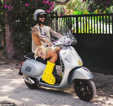 Colombian singer Maluma has also been spotted wearing the boots on his Instagram post and he wrote in his caption: 'You know who you saw first [wearing the yellow boots]' Big Red Boots, Yellow Crocs, Crocs Boots, Yellow Boots, New Boots, Don Juan, Red Boots, Boot Brands, Paris Hilton