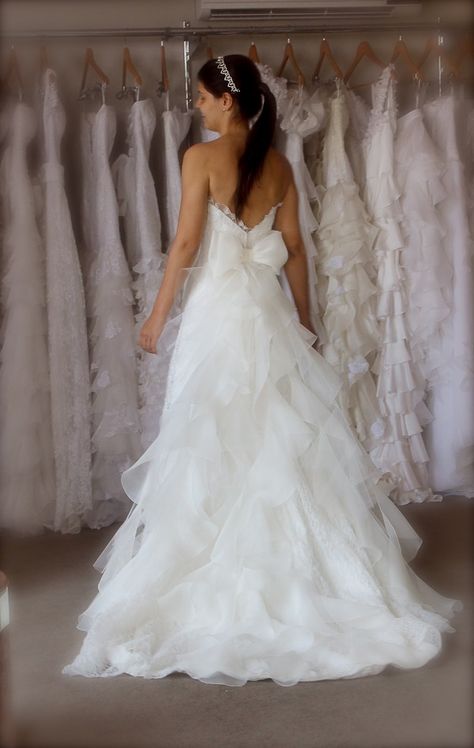 Beautiful dress with back bow Flowy Layered Wedding Dress, Wedding Bow Dress, Wedding Dresses Fluffy, Wedding Dress With Bow On Back, Wedding Dress Bows, Wedding Dresses Bow, Wedding Dress Big Bow, Tulle Layered Wedding Dress, Ruffle Wedding Dresses