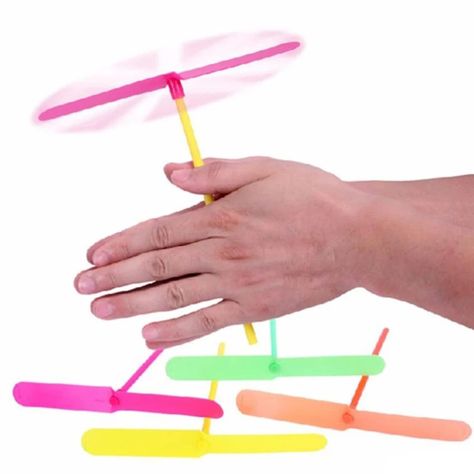 PRICES MAY VARY. Package Includes; 20pcs; Color random delivery, enough quantity. Quality Material: Made of plastic, Lightweight, durable and non-toxic, and keep your child safe. Product Size: Leaf 16.6cm/6.5 inch, pole 16.8cm/6.6 inch, perfect fit for children's little one's hands. How to Use: Hands rub moves toy's shank, They will fly in the sky, experience the thrill of flight. Which will give you and your kids a never ending fun time. Wide Application: Perfect for themed parties, celebration Childhood Memories Quotes, Childhood Memories 90s, Flying Toys, Outdoor Toys For Kids, Childhood Games, Nostalgic Toys, Practical Jokes, Party Toys, Outdoor Toys