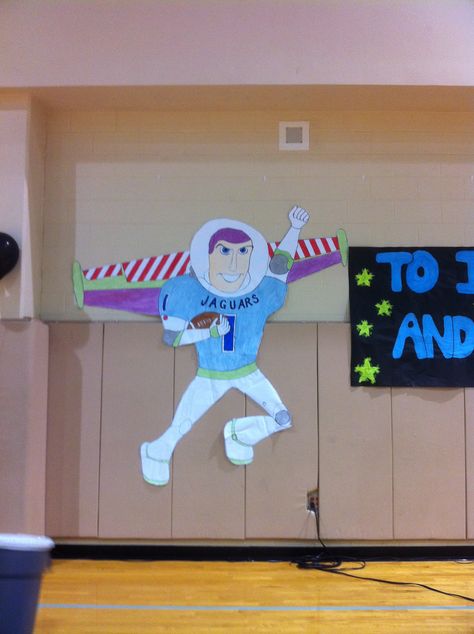 "To Infinity and Beyond" pep rally theme.  Buzz Lightyear dressed in a Johnson Jaguar's football jersey. Disney Pep Rally Ideas, Disney Pep Rally, Pep Rally Outfits, Football Spirit Signs, Pep Rally Ideas, Pep Rally Themes, Asb Ideas, Stuco Ideas, Rally Ideas