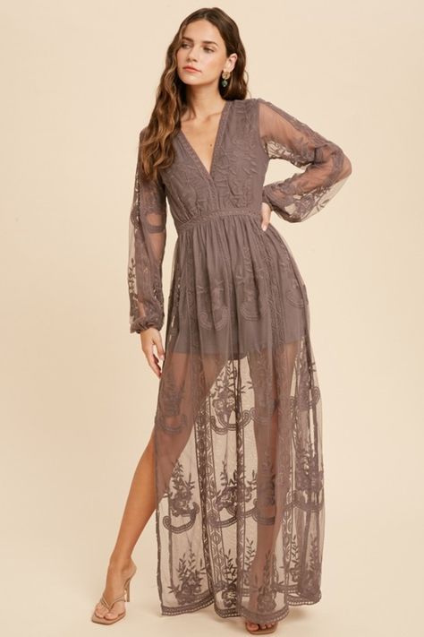 The Elegant Romance Long Sleeve Lace Maxi Romper Dress is the perfect bohemian-inspired mesh lace maxi romper dress. Be the best-dressed wedding guest, boho bride, or event attendee in this beautiful floral embroidered lacey maxi dress complete with lined shorts for a beautiful romper vibe. Perfect for photoshoots, this Deep V-neckline dress features no front hook eye closure, side slits, and hidden back zipper closure. Front + Shorts lining, long sleeves/cap sleeve maxi dress. Model is wearing Wedding Romper, Lace Maxi Romper, Maxi Romper Dress, Bohemian Rompers, Maxi Romper, Lace Dress Boho, Embroidered Maxi Dress, Neckline Dress, Dress Model