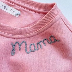 How To Sew Names On Sweaters, Embroider T Shirt Diy, Embroidery Word Patterns, How To Sew Sweater Fabric, How To Embroider A Sweatshirt By Hand, Hand Stitched Sweatshirt Diy, Diy Yarn Embroidery Sweatshirt, Diy Hand Stitched Name, Diy Stitch Sweatshirt