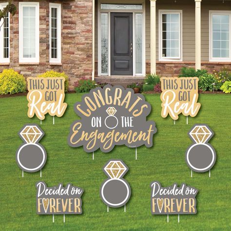 PRICES MAY VARY. Engagement Lawn Decorations INCLUDES 8 coordinating Congrats On The Engagement yard decorations: 1 Large Congrats On The Engagement, 2 Just Got Real Shapes, 2 Forever Shapes, 3 Ring Shapes and 16 stakes for displaying. Easy assembly instructions are also included. PERFECT FOR ANY LOCATION! Congrats On The Engagement Yard Signs SIZE Large Congrats On The Engagement 22" x 16.75"; Just Got Real Sign 10” x 10.5”; Forever Sign 12” x 8.25”; Rings 7.75” x 12”. Congrats yard decor is an Outdoor Engagement Party, Backyard Engagement Parties, Engagement Party Planning, Engagement Signs, Lawn Decorations, Birthday Yard Signs, Custom Yard Signs, Just Engaged, Wedding Congratulations