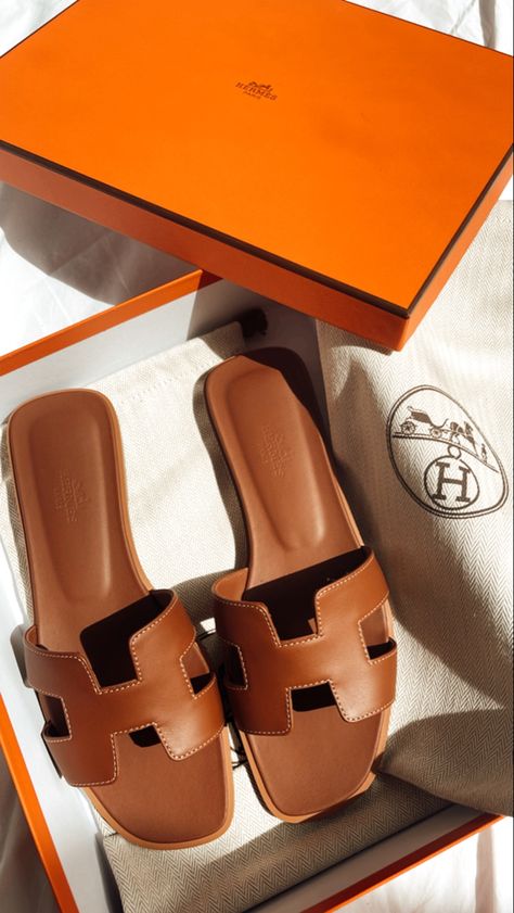 Just bought these beautiful Hermès Oran Sandals in gold. Such a classic closet staple. New Hermes Sandals, Hermes Sandals Brown, Hermes Oran Brown, Gold Hermes Sandals, Hermes Brown Sandals, Oran Sandals Hermes, Oran Hermes Sandals, Hermes Sandals Women, Hermes Sandals Aesthetic