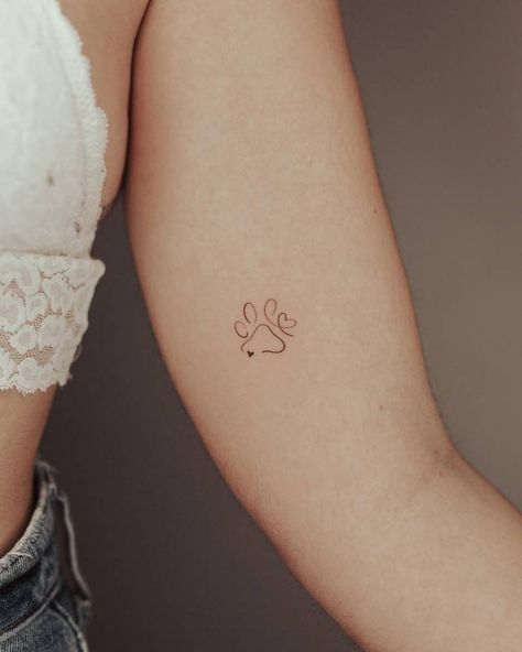 Minimalistic dog paw tattoo located on the inner arm. Paw Print Tattoos, Small Dog Tattoos, Inner Arm Tattoos, Dog Tattoo Ideas, Tattoos For Dog Lovers, Pawprint Tattoo, Dog Paw Tattoo, Herz Tattoo, Small Pretty Tattoos