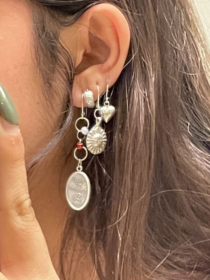 Eclectic Silver Earrings, Love Quinn Jewelry, Cool Assessories, Coastal Jewelry Aesthetic, Ear Piercing Arrangements, Silver Jewelry Inspiration, Summer Silver Jewelry, Mixed Metal Jewelry Stack, Silver Earring Stack Aesthetic