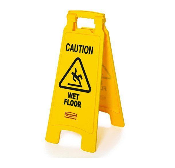 a caution wet floor sign on a white background