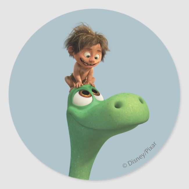 a cartoon character riding on the back of a dinosaur's head in a round sticker