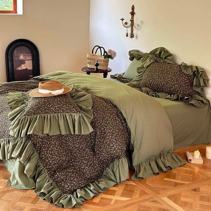 a bed with green ruffled bedspread and matching comforter in a bedroom