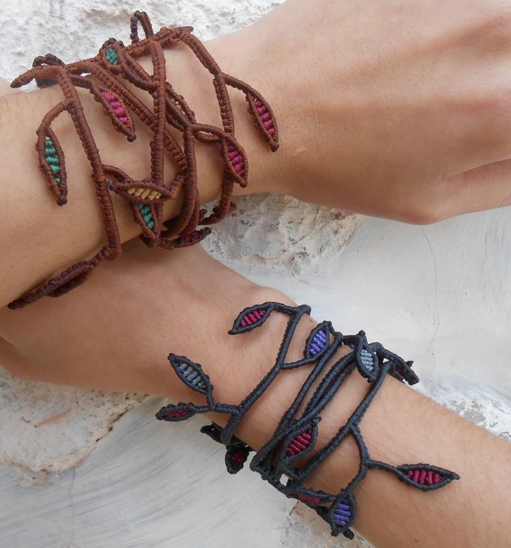 a woman's arm with two bracelets on it and one is decorated with beads