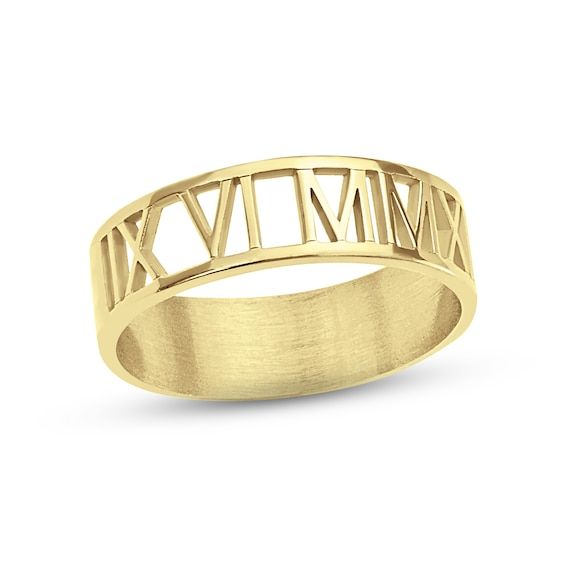 an 18k yellow gold ring with roman numerals on the front and sides