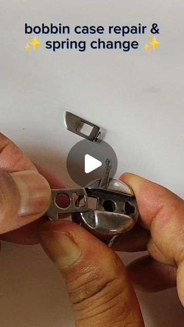 someone is cutting the bottom part of a pair of scissors