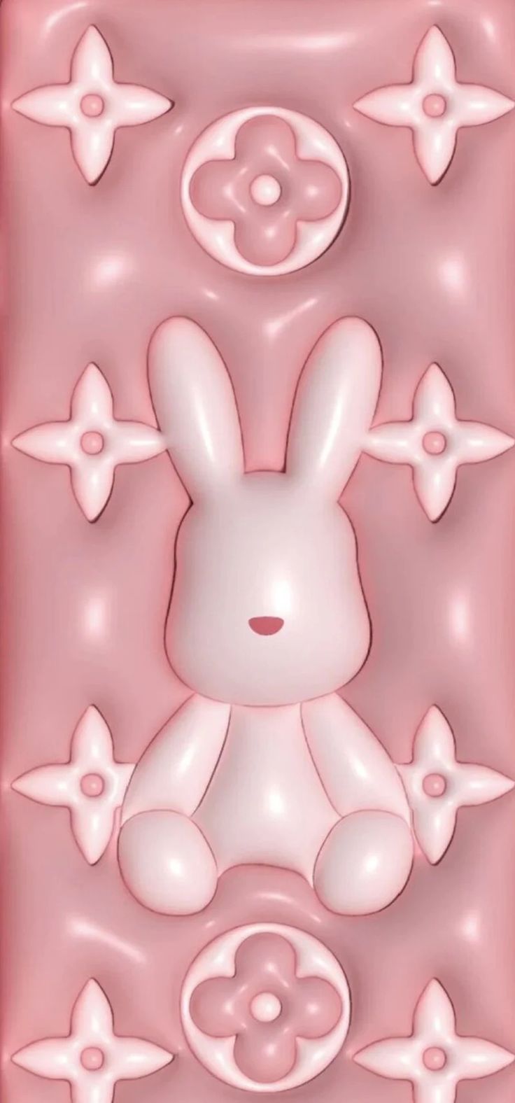 a pink plastic mold with a bunny on it