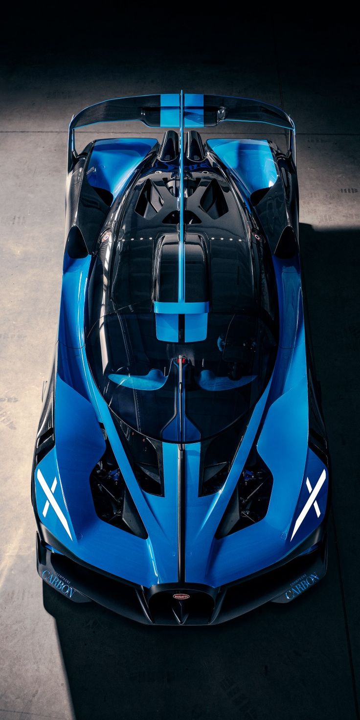 a blue sports car is shown from above