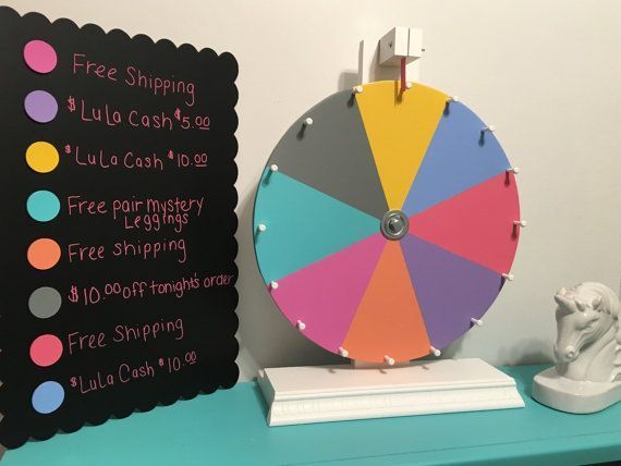 there is a colorful wheel on the shelf next to a sign that says free shipping