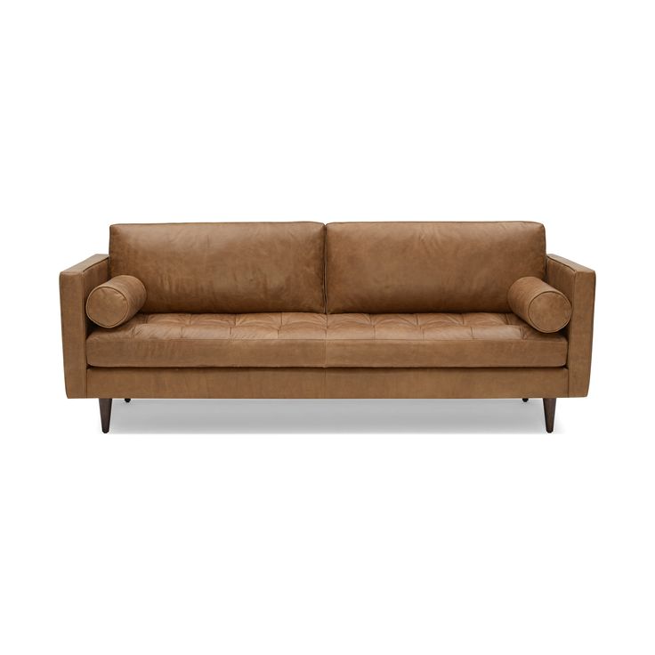 a brown leather couch on a white background