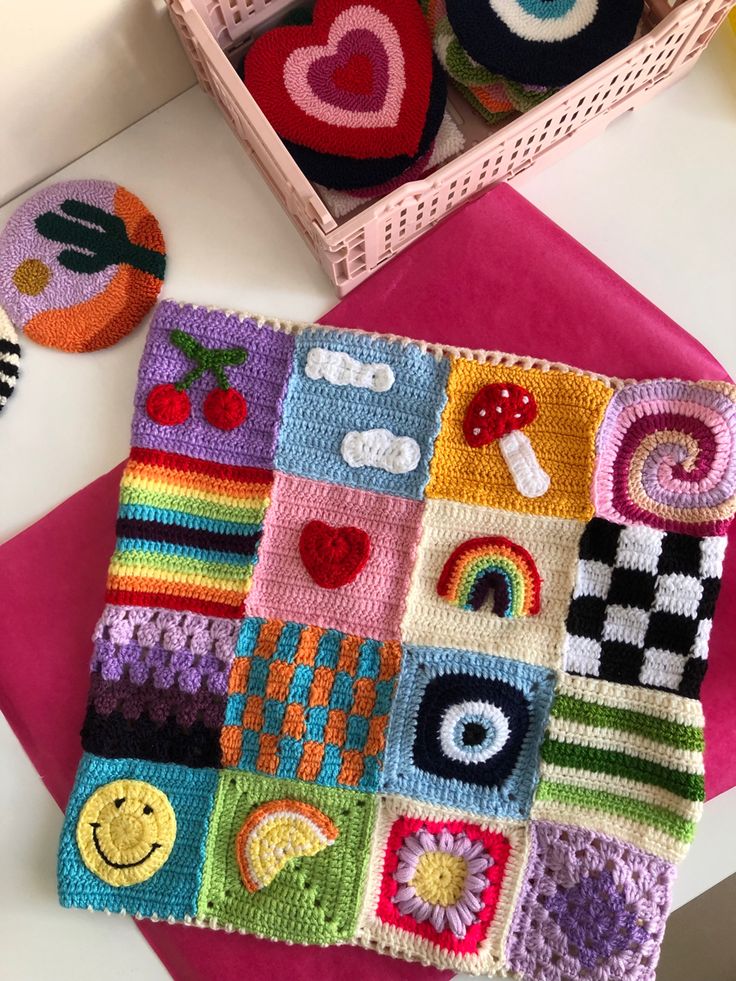 crocheted coasters are displayed on a table