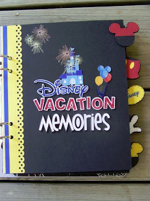 a disney vacation memory book with mickey mouse magnets