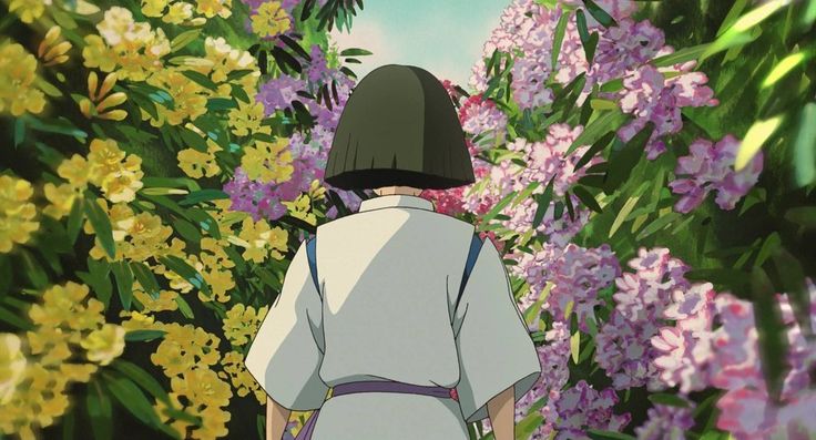 an animated image of a person walking through flowers