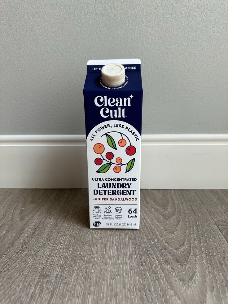 a carton of glan's milk sitting on the floor next to a wall