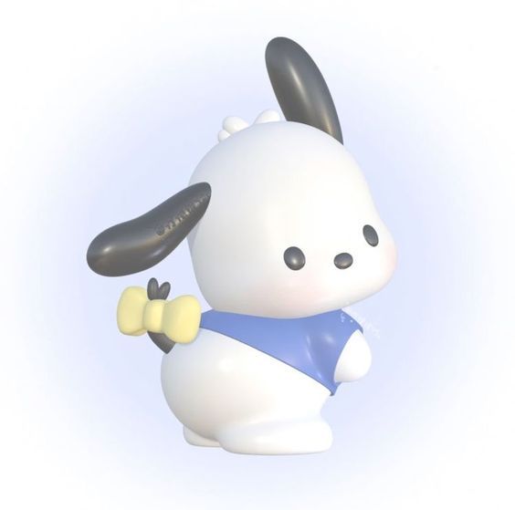 a white and black toy rabbit holding a yellow object in it's right hand