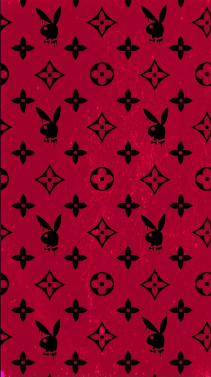 a red background with black and white designs on it's sides, all over the place