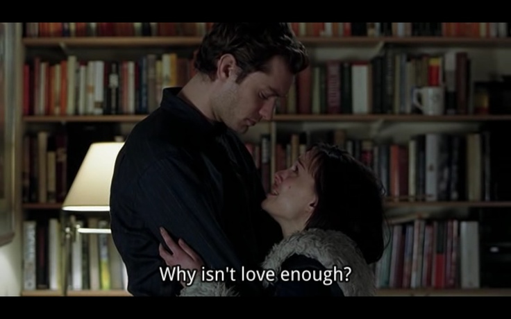 a man and woman standing in front of bookshelves with the caption why isn't love enough?