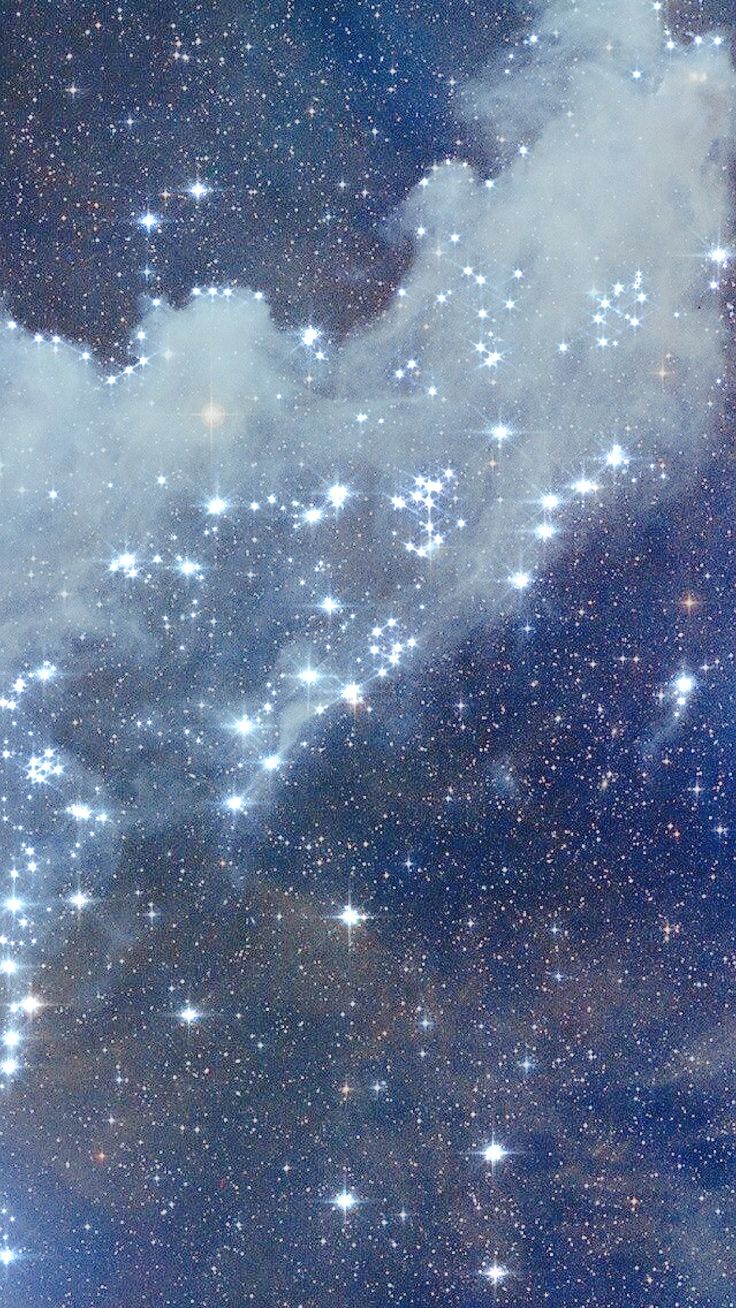 the sky is filled with stars and clouds