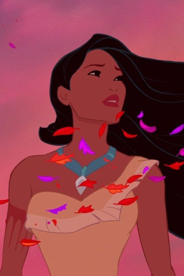 an animated image of a woman with long black hair and necklaces on her chest