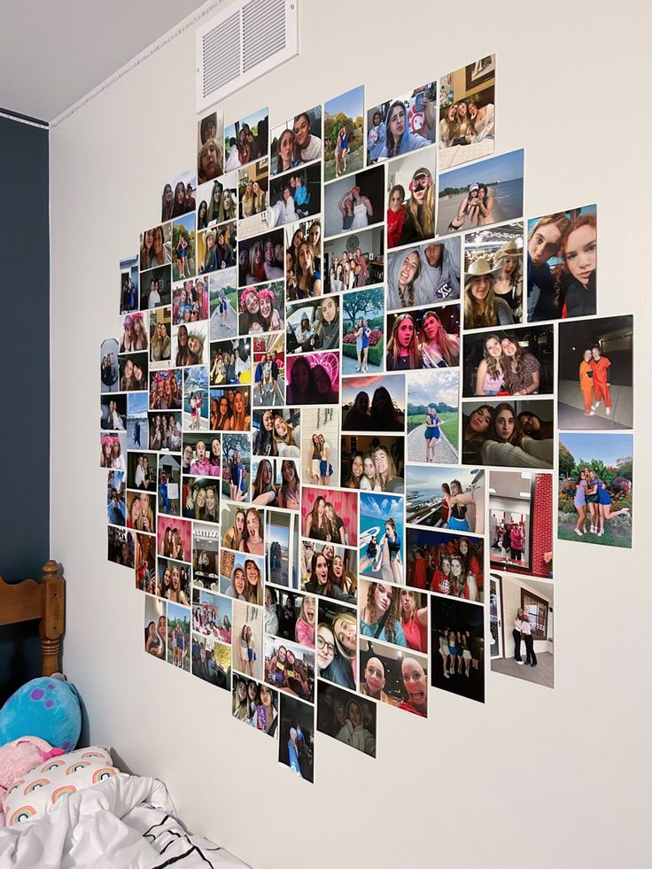 a collage of photos hanging on the wall above a bed