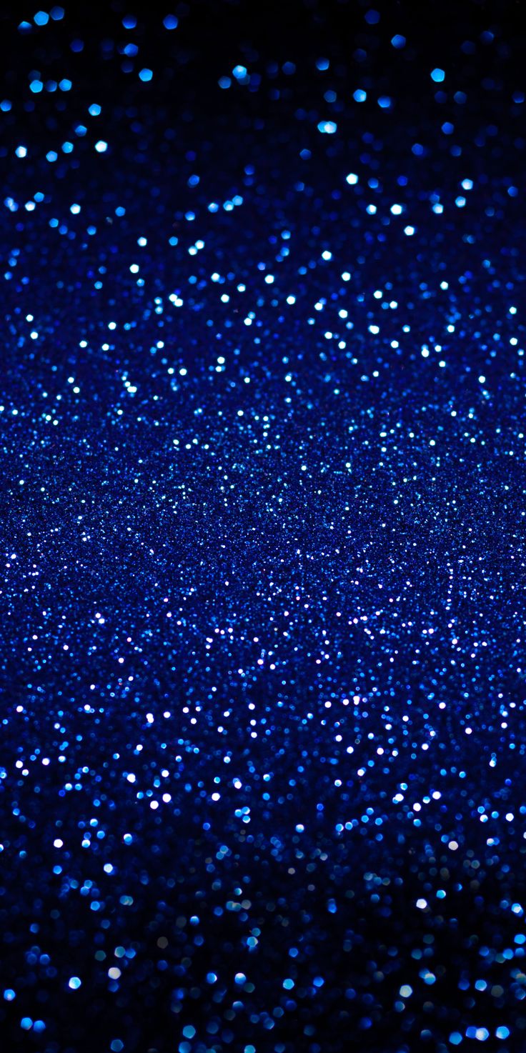 the blue glitter is shining in the dark