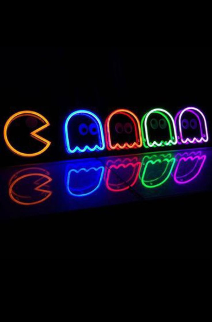 neon light up letters with ghost faces on them