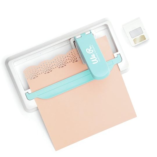 a pink envelope with a mint green file attached to it