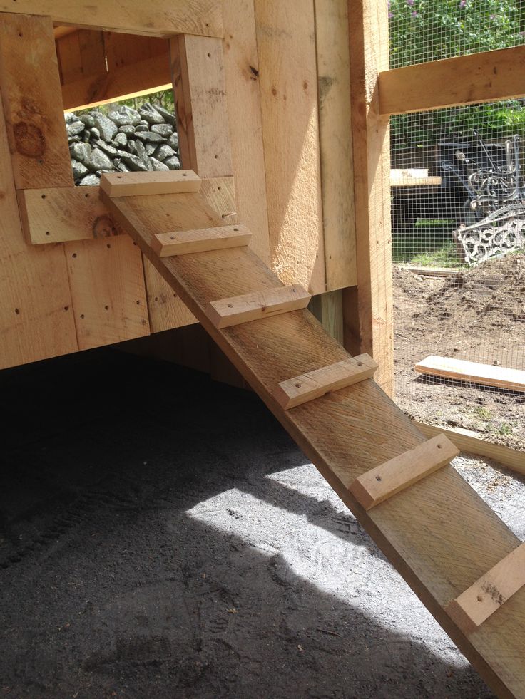 the stairs are made from wood and have been built into the side of the building