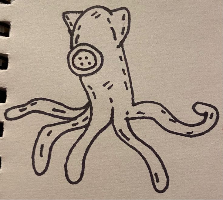 a drawing of an octopus on a piece of paper