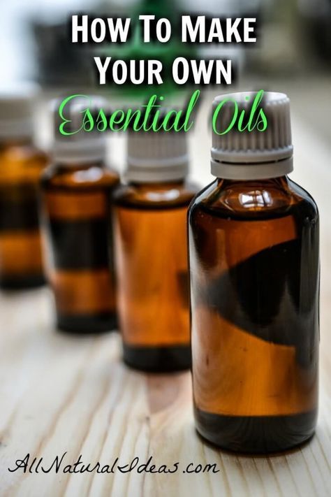 bottles filled with essential oils sitting on top of a wooden table next to the words how to make your own essential oils