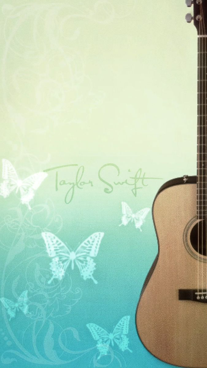 an acoustic guitar sitting on top of a blue and green background with butterflies around it