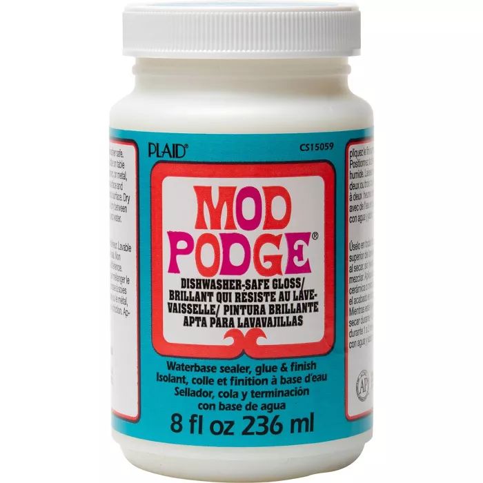 a bottle of mod podge on a white background