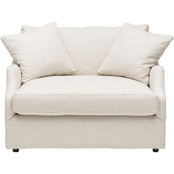 a white couch with two pillows on it's back and one arm facing the camera