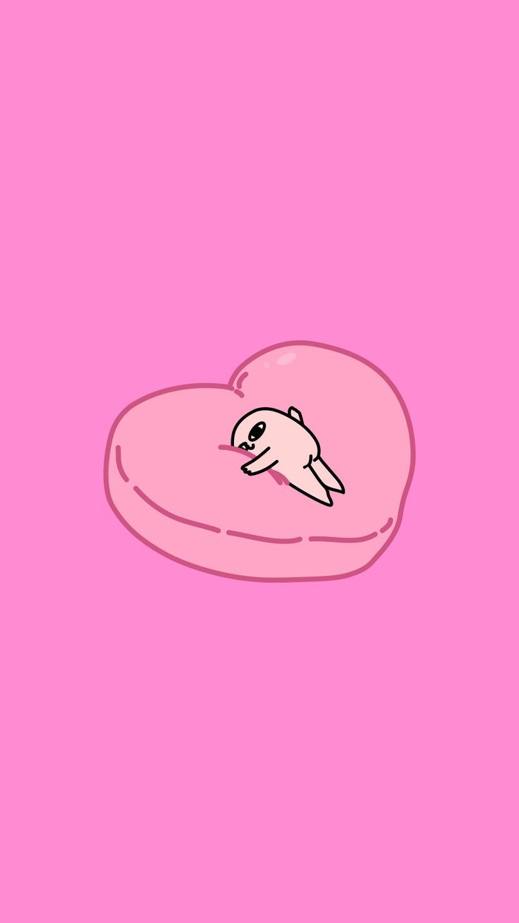 a pink heart shaped pillow with a bird on it