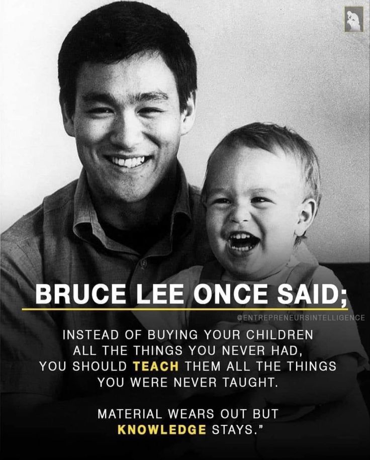 a man holding a baby in his arms with the caption bruce lee once said instead of buying your children all the things you never had, you should teach them