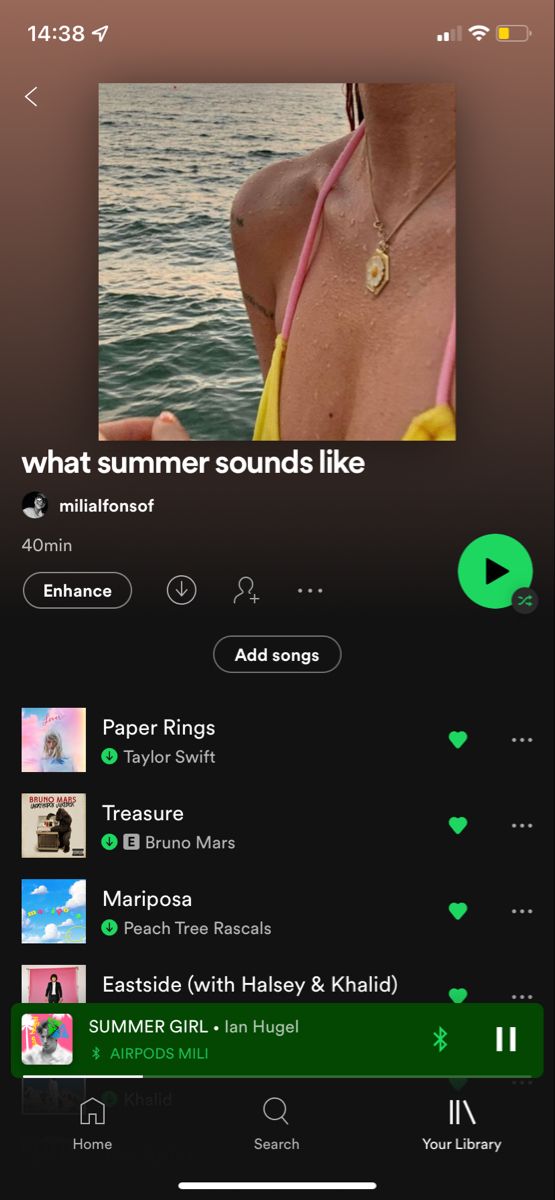 the music player is running on the iphone's playlist page, and it appears to be reading what summer sounds like