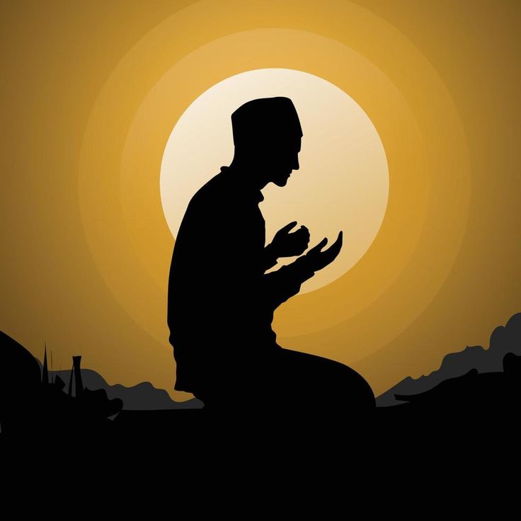 the silhouette of a man sitting in front of a sunset with his hands folded up