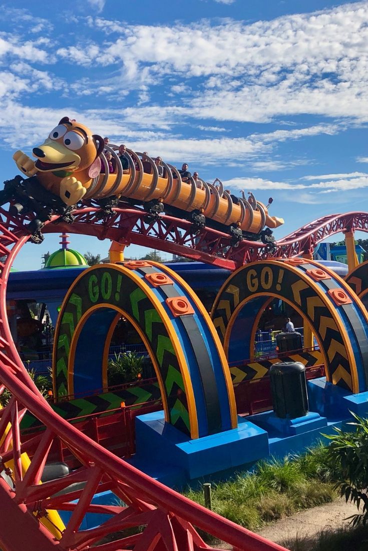 an amusement park with cars and roller coasters